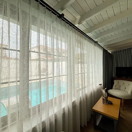 Talles * Çeşme